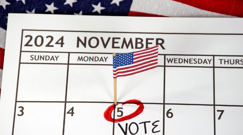 A calendar displaying the election date prominently, accompanied by the word "Vote" to encourage participation.